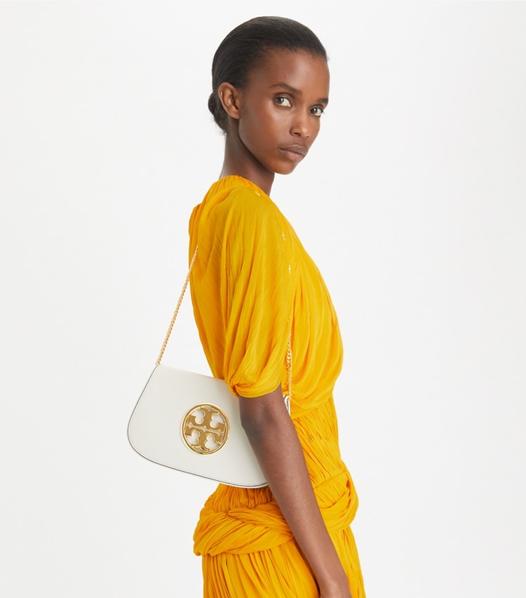 Tory Burch designer clutches Reva Clutch in NEW IVORY accessory on model