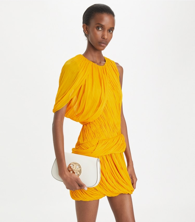 Tory Burch designer clutches Reva Clutch in NEW IVORY additional on model
