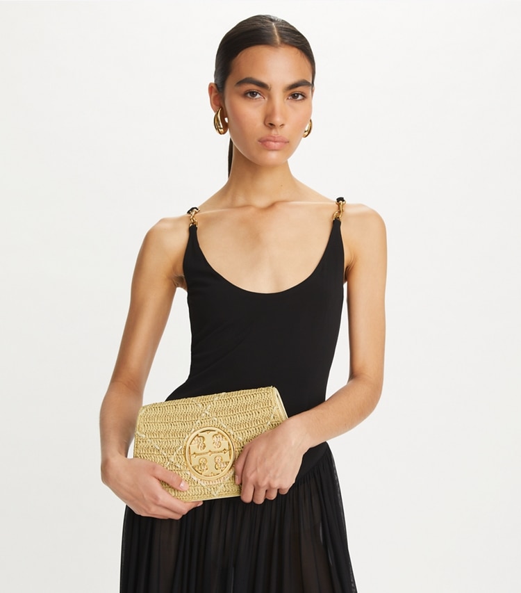 Tory Burch designer clutches Reva Raffia Clutch in Natural additional on model