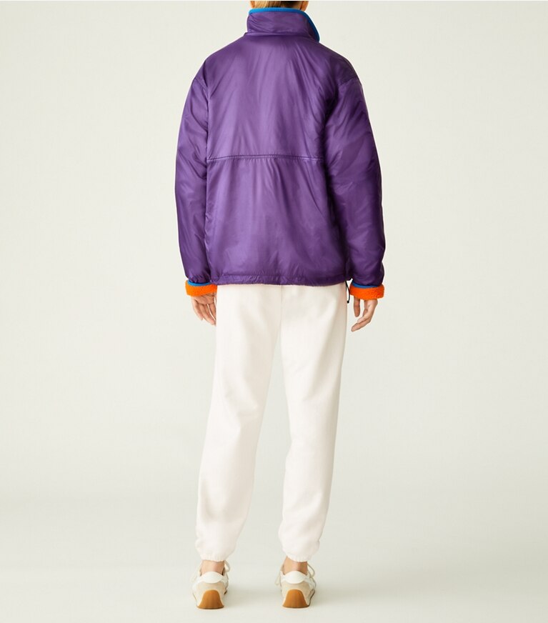 Tory Sport designer coats Reversible Nylon Fleece Pullover Jacket in Eggplant / Poppy Red front