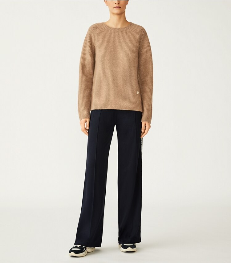 Tory Sport designer sweaters Ribbed Cashmere Sweater in Natural Heather on model front