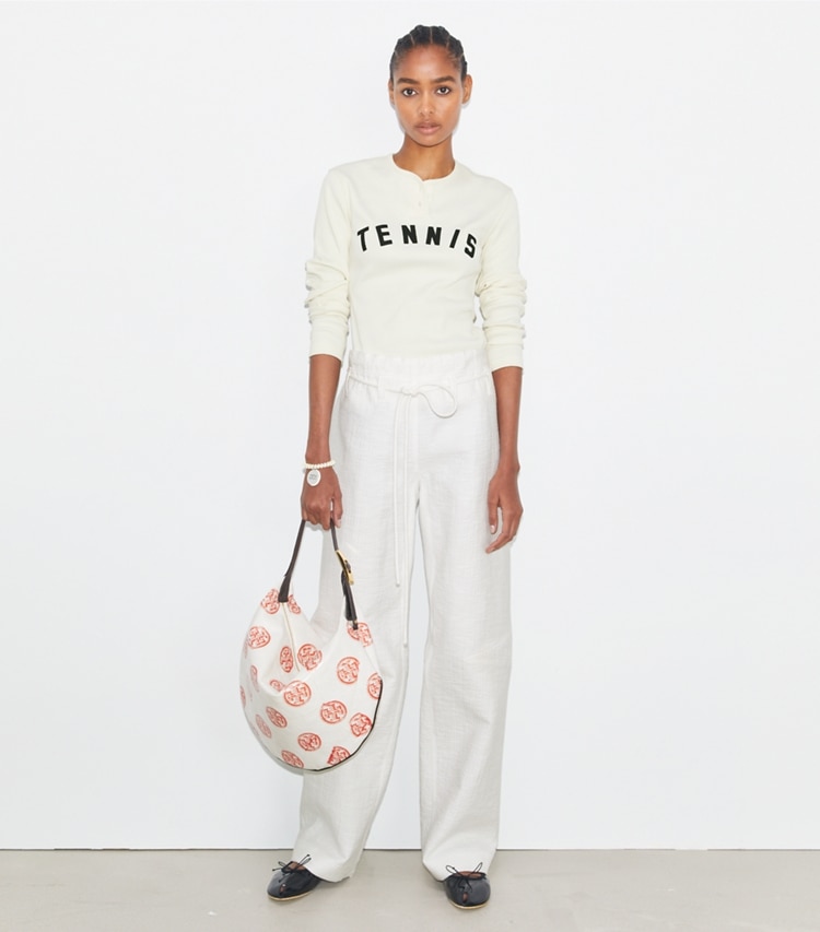 Tory Sport designer tops Ribbed Cotton Tennis Henley in NEW IVORY on model front
