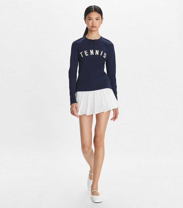 Tory Sport designer tops Ribbed Cotton Tennis Henley in Tory Navy on model front
