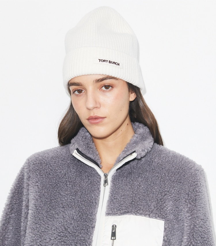 Tory Burch designer hats Ribbed Knit Beanie in Light Brown accessory on model