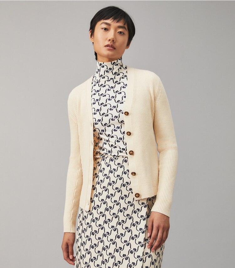 Tory Burch designer sweaters Ribbed Merino Wool Cardigan in French Cream on model detail