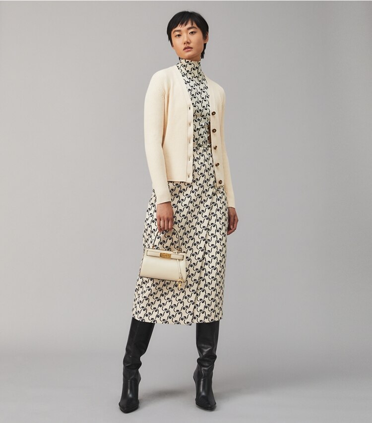 Tory Burch designer sweaters Ribbed Merino Wool Cardigan in French Cream on model front