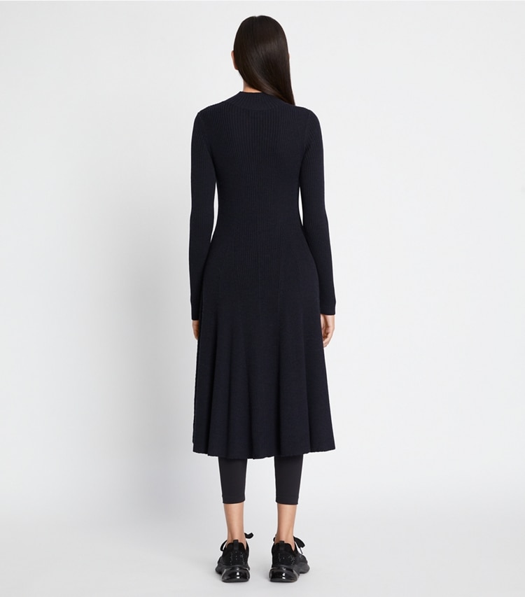 Tory Sport designer dresses Ribbed Turtleneck Dress in French Navy on model back