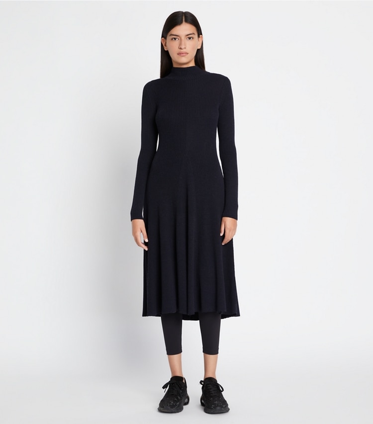 Tory Sport designer dresses Ribbed Turtleneck Dress in French Navy on model front
