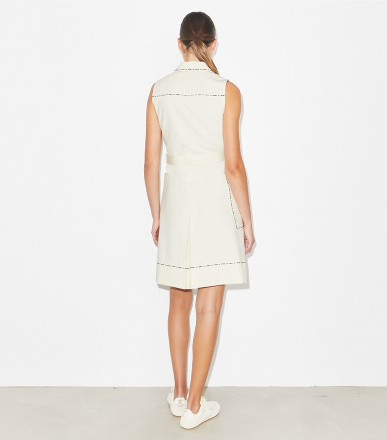 Tory Burch designer robes Robe de golf extensible à surpiqûres in New Ivory on model back