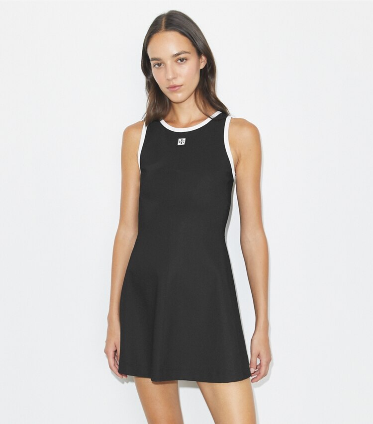Tory Burch designer robes Robe de tennis en jersey à dos nageur in Black / Snow White on model detail