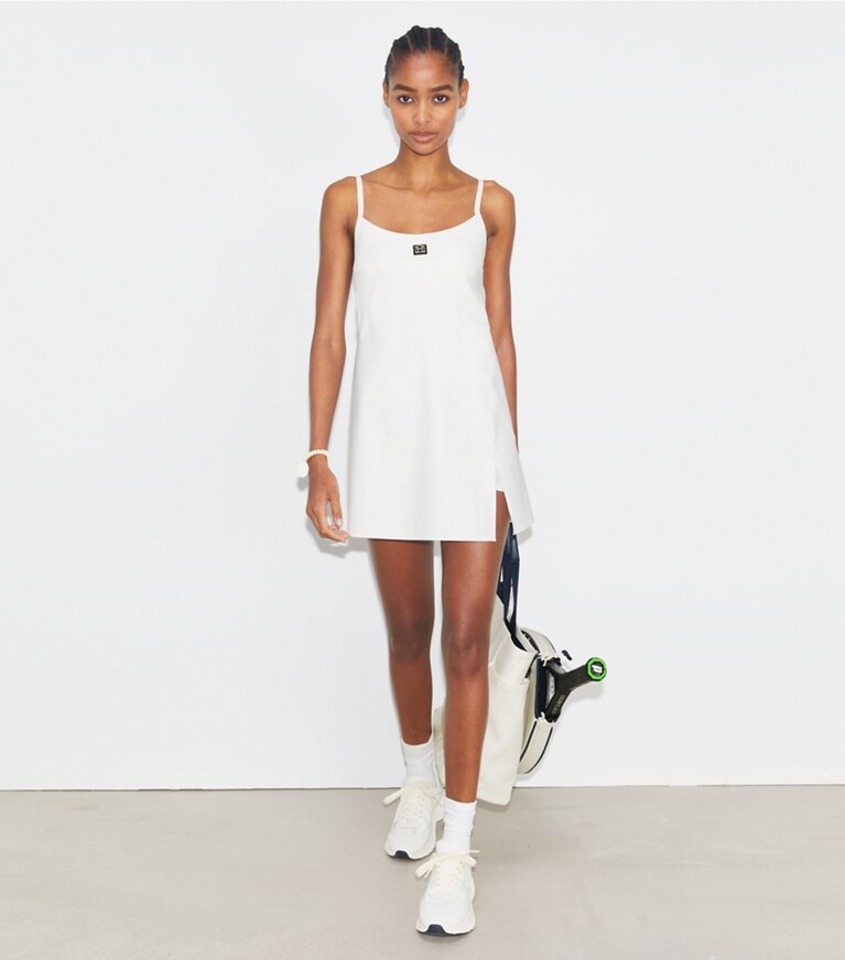 Tory Sport designer robes Robe de tennis en nylon in Snow White front
