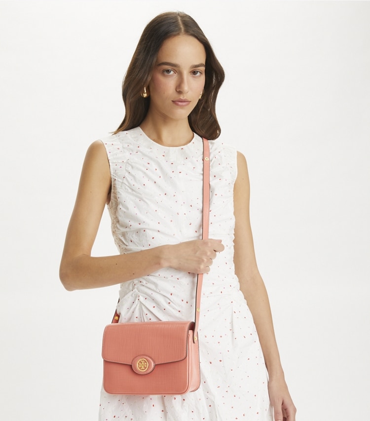 Tory Burch designer shoulder bags Robinson Crosshatched Convertible Shoulder Bag in Coral Crush accessory on model