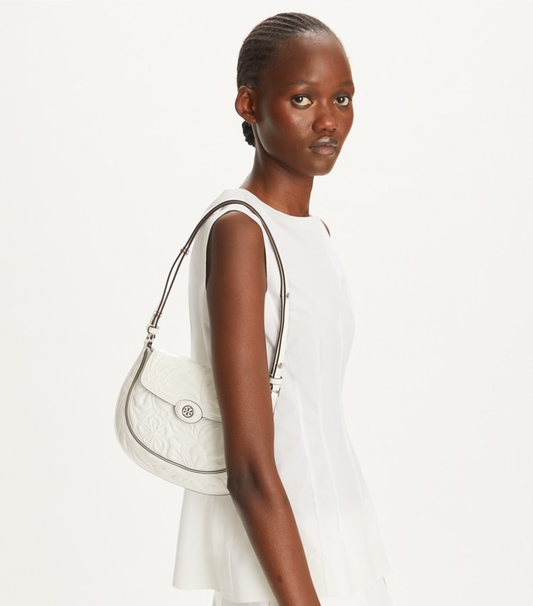 Tory Burch designer shoulder bags Robinson Floral Embossed Saddlebag in Blanc accessory on model