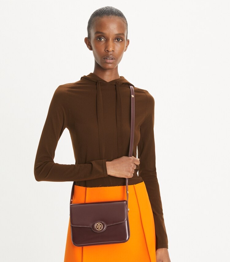 Tory Burch designer shoulder bags Robinson Floral Spazzolato Convertible Shoulder Bag in TEMPRANILLO additional on model