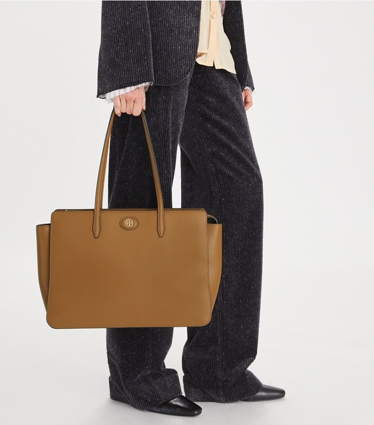Tory Burch designer tote bags Robinson Pebbled Tote in Tiger'S Eye accessory on model
