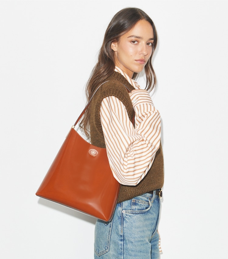 Tory Burch designer hobo bags Robinson Spazzolato Hobo Bag in DARK SIENNA accessory on model