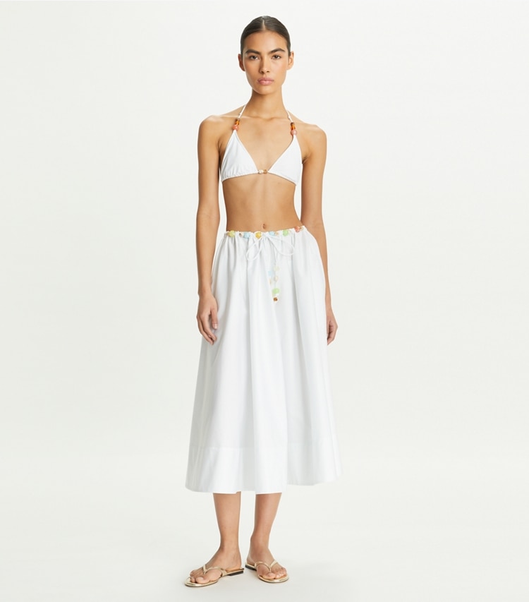 Tory Burch designer strandmode Rock aus Baumwollpopeline mit Perlen in White modell von vorn