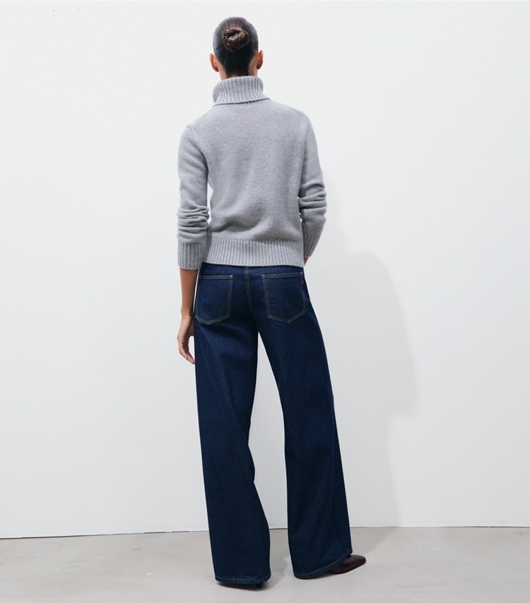 Tory Burch designer strickware Rollkragenpullover aus Kaschmir in Smoky Gray Melange on model back