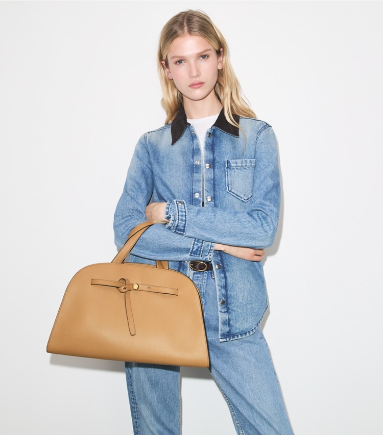 Tory Burch designer satchels Romy Bauletto in Tiramisu additional on model