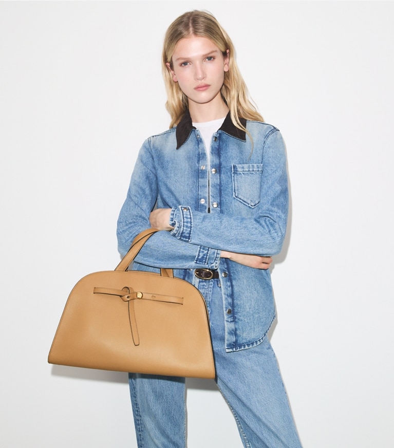 Tory Burch designer satchels Romy Bauletto in Tiramisu additional on model