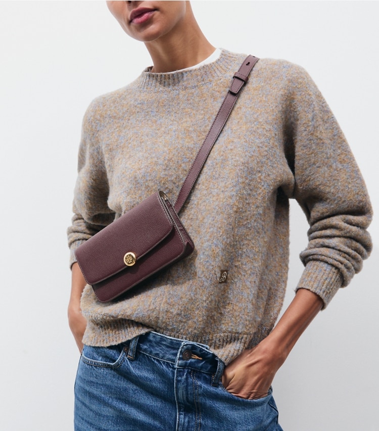 Tory Burch designer belt bags Romy Belt Bag in Dark Carmine accessory on model
