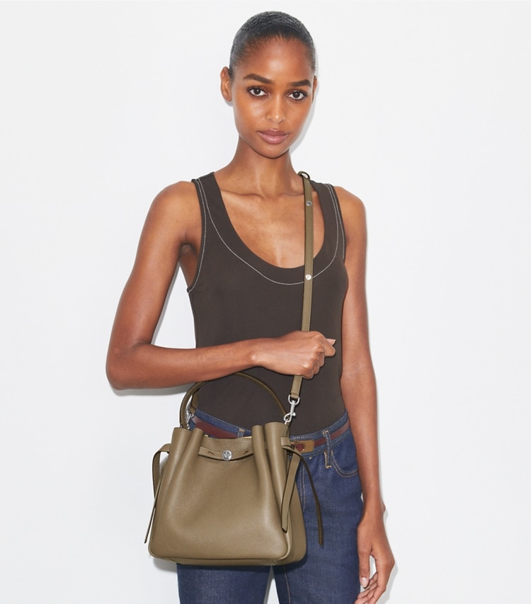 Tory Burch designer crossbody bags Romy Bucket Bag in Wild Mushroom accessory on model