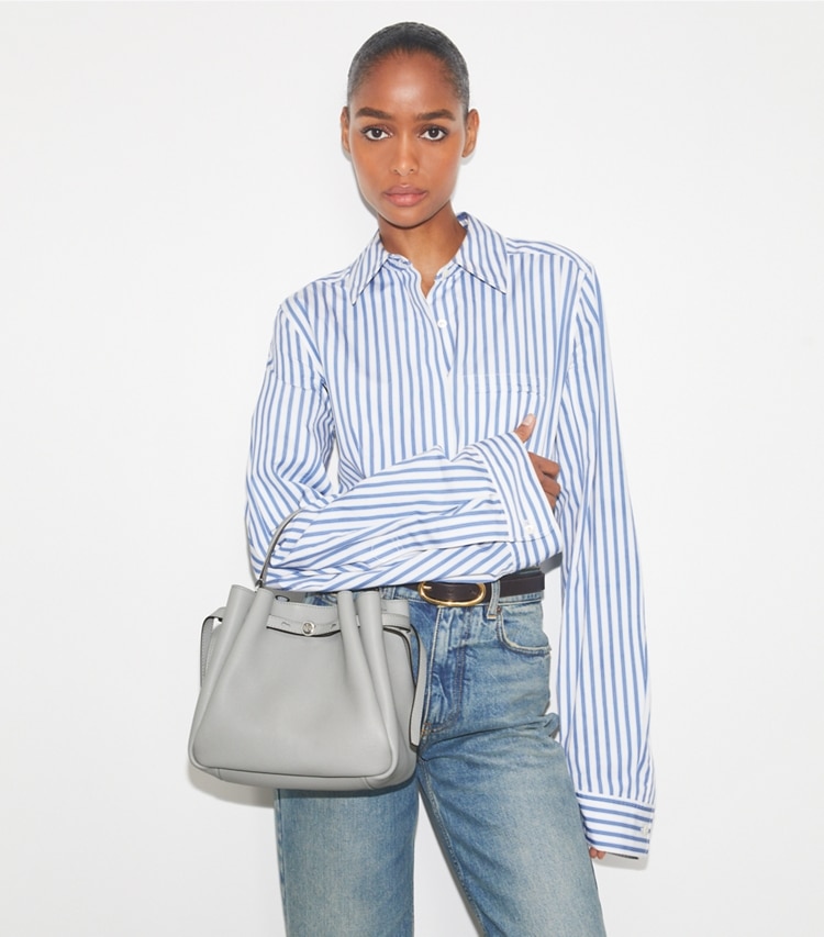 Tory Burch designer crossbody bags Romy Bucket Bag in Light Granite additional on model