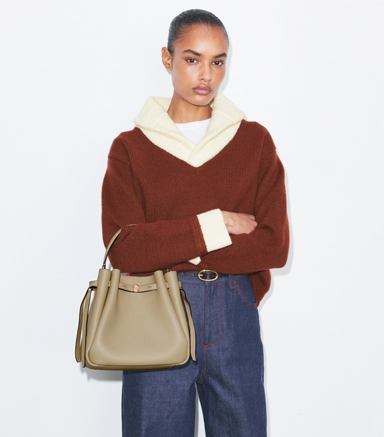 Tory Burch designer crossbody bags Romy Bucket Bag in Soft Cement additional on model