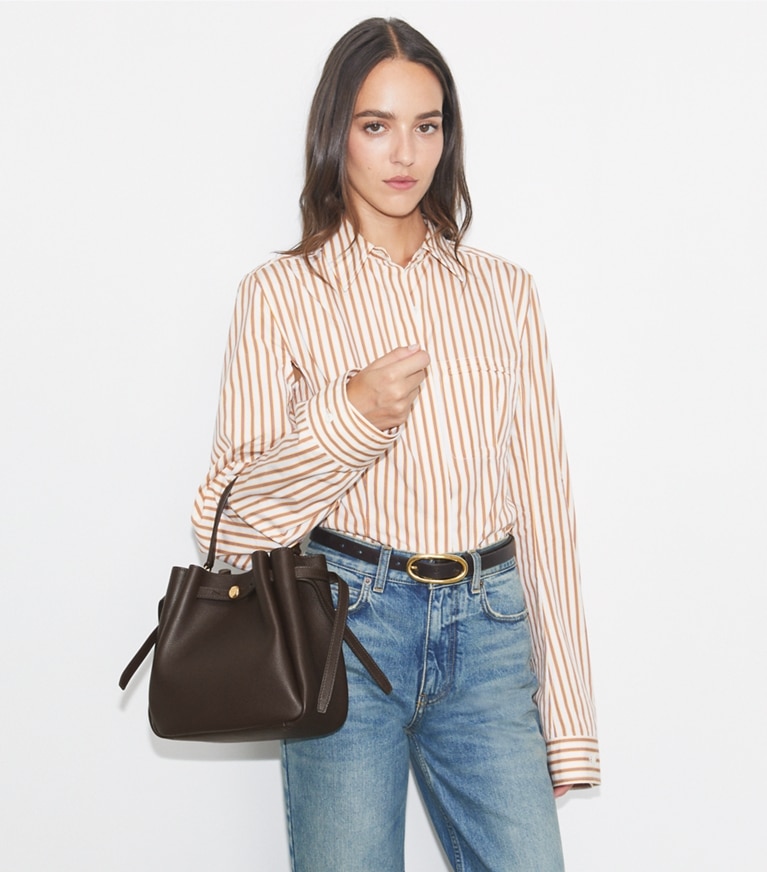 Tory Burch designer crossbody bags Romy Bucket Bag in Deep Brown additional on model