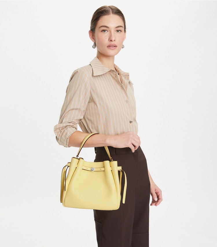 Tory Burch designer crossbody bags Romy Bucket Bag in Lemon additional on model