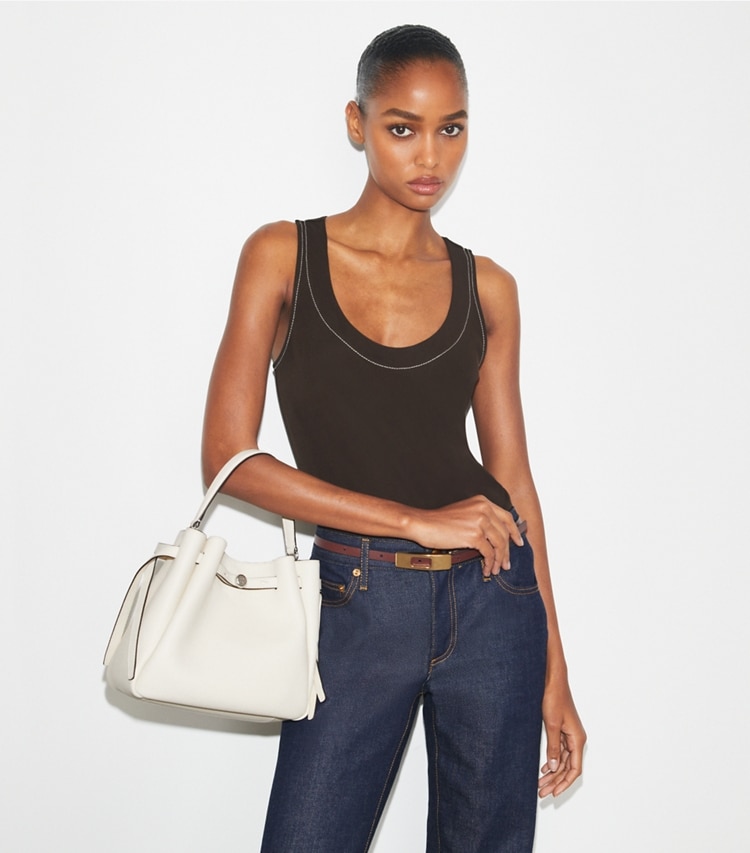 Tory Burch designer crossbody bags Romy Bucket Bag in Light Cream additional on model
