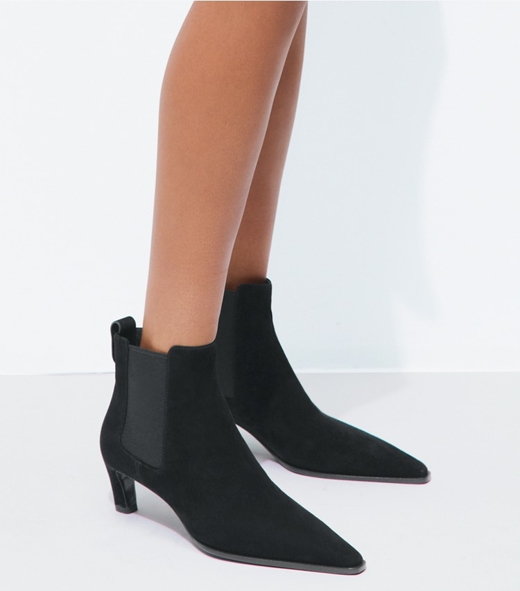 Tory Burch designer ankle boots Romy Chelsea Boot in PERFECT BLACK accessory on model