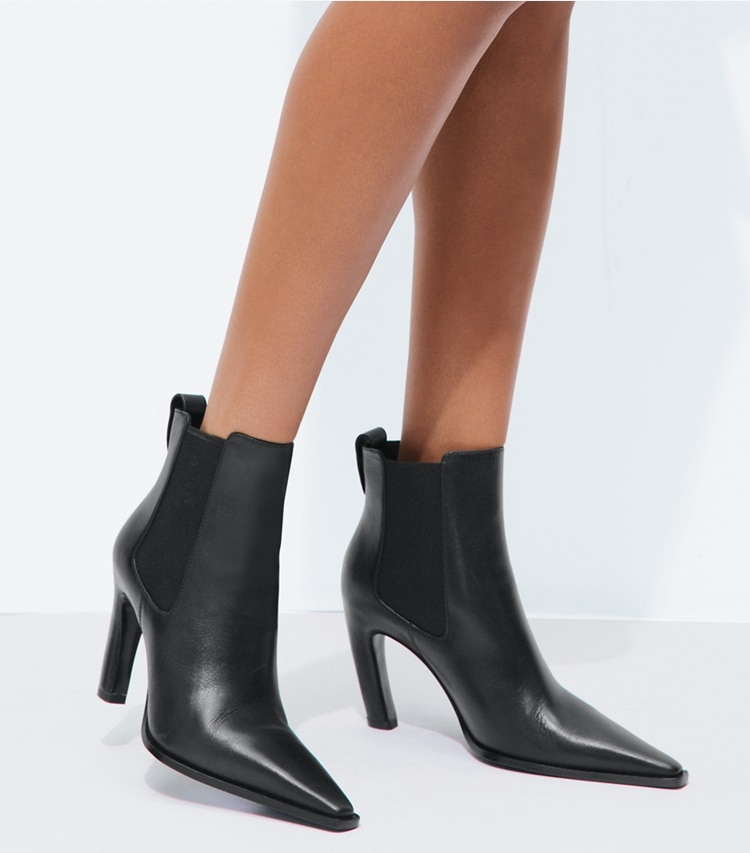 Tory Burch designer ankle boots Romy Chelsea Heeled Boot in PERFECT BLACK accessory on model
