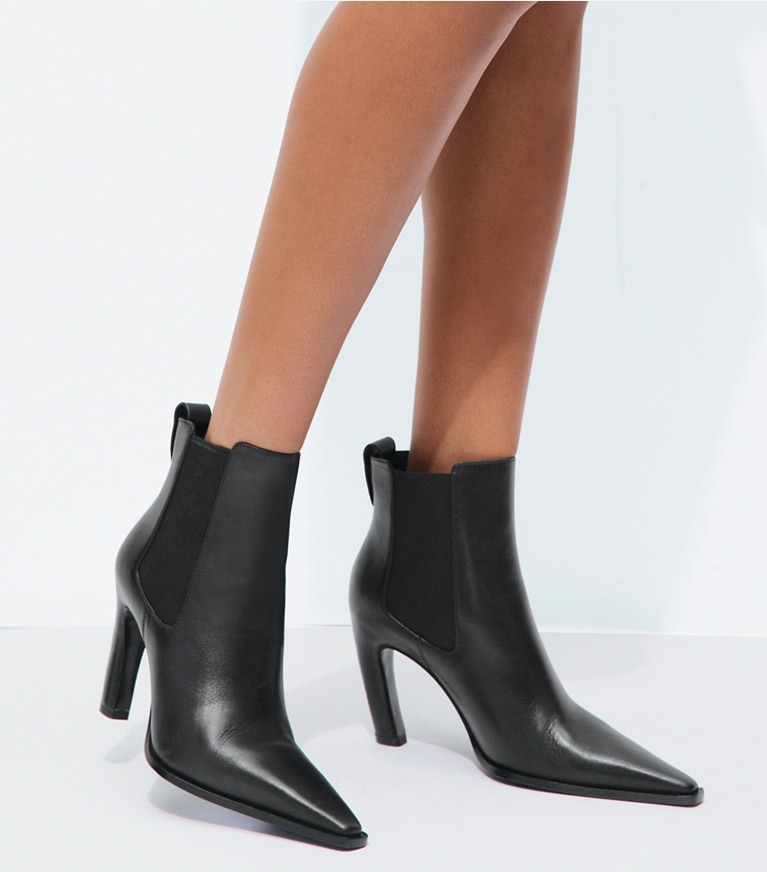 Tory Burch designer ankle boots Romy Chelsea Heeled Boot in PERFECT BLACK accessory on model