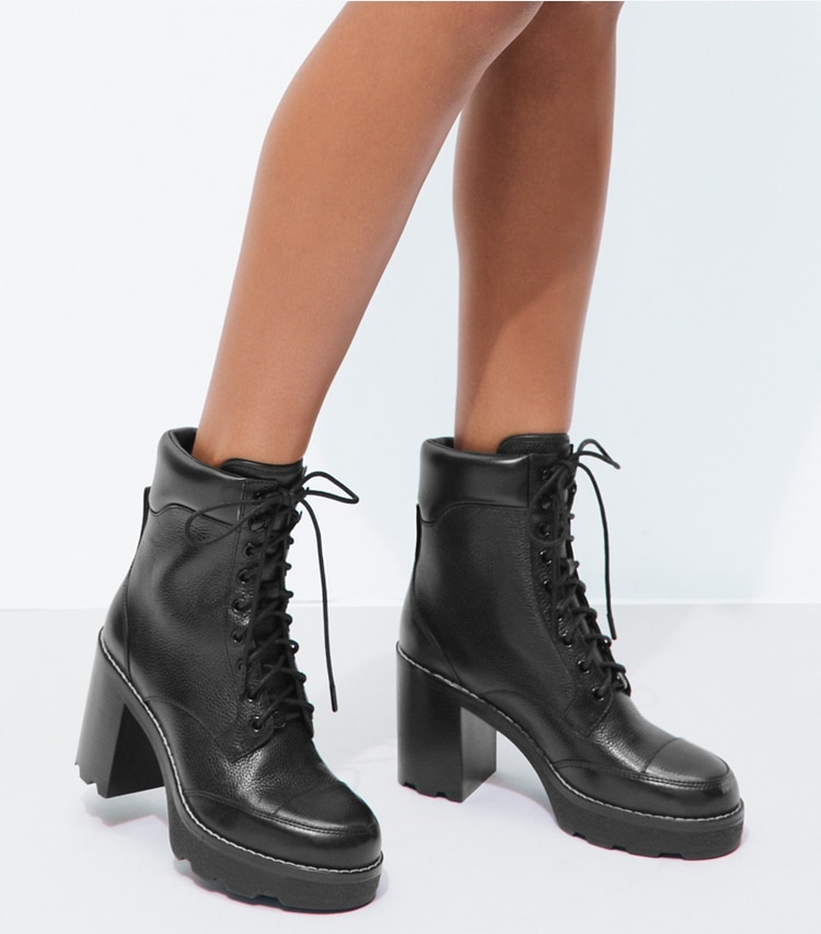 Tory Burch designer ankle boots Romy Lug Heeled Boot in PERFECT BLACK accessory on model