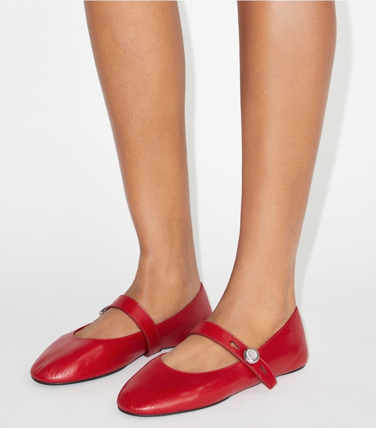 Tory Burch designer flats Romy Mary Jane in TOUCAN RED accessory on model