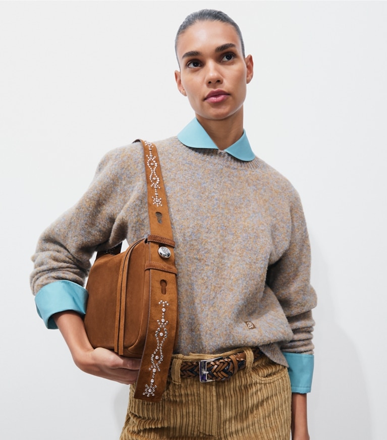 Tory Burch designer shoulder bags Romy Studded Suede Shoulder Bag in Caramel accessory on model
