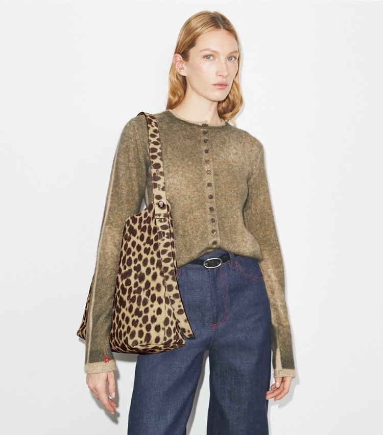 Tory Burch designer shoulder bags Romy Suede Hobo Bag in Cheetah Spots accessory on model