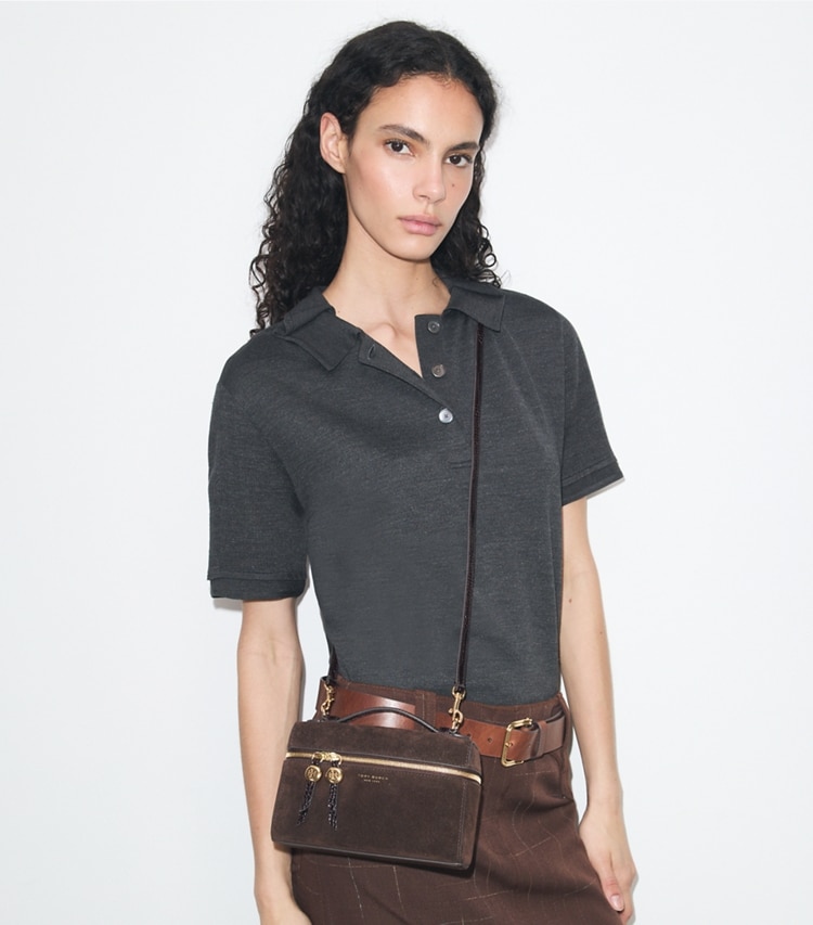 Tory Burch designer crossbody bags Romy Suede Slim Top Handle Bag in DARK COCOA accessory on model