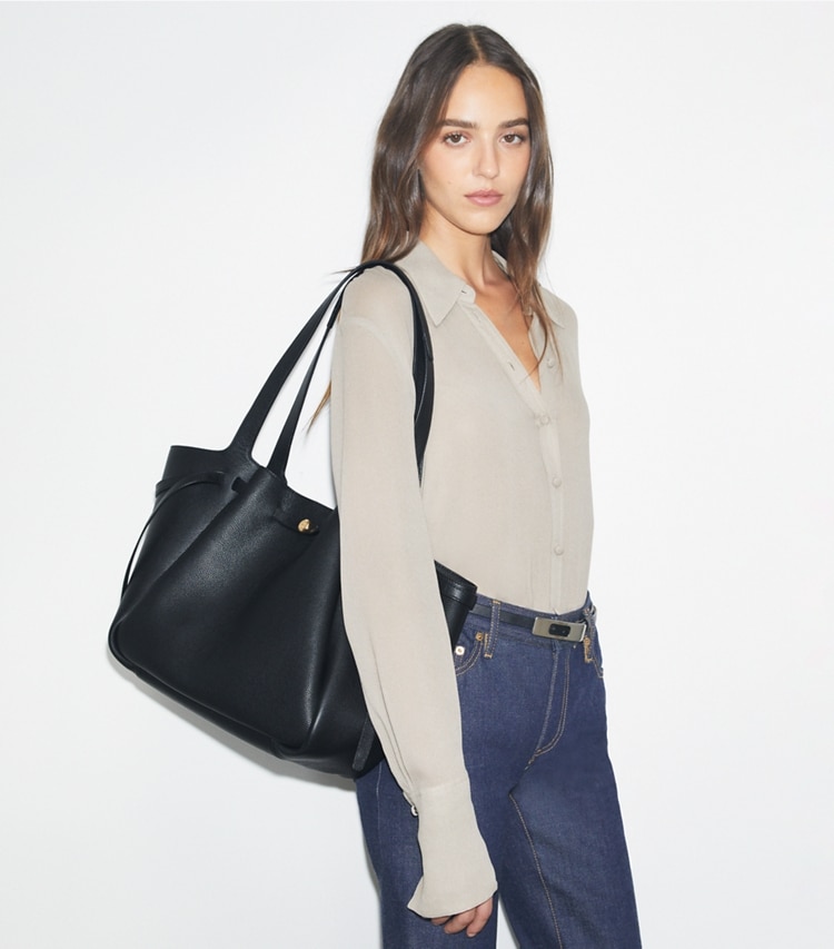 Tory Burch designer tote bags Romy Tote in Black accessory on model
