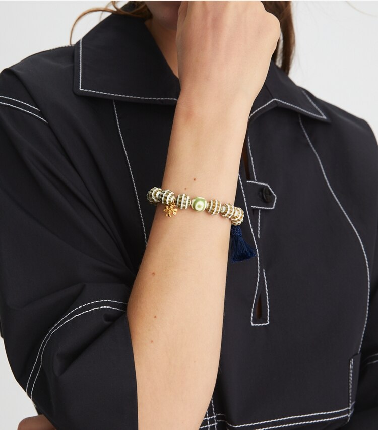 Tory Burch designer bracelets Roxanne Beaded Tassel Bracelet in Rolled Gold / Multi accessory on model