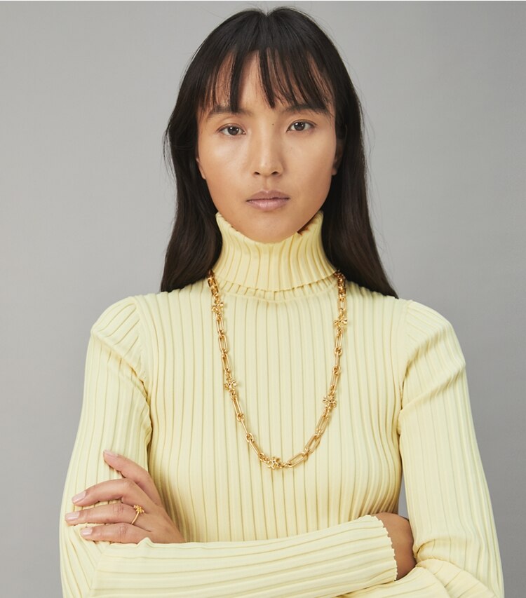 Tory Burch designer necklaces Roxanne Chain Long Necklace in Rolled Tory Gold accessory on model