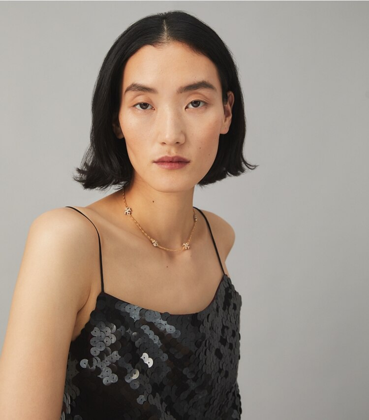 Tory Burch designer necklaces Roxanne Chain Pavé Delicate Necklace in Rolled Tory Gold / Crystal accessory on model