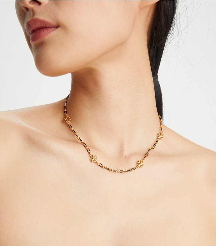 Tory Burch designer necklaces Roxanne Chain Striped Delicate Necklace  in Rolled Tory Gold / Black accessory on model