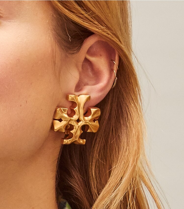 Tory Burch designer earrings Roxanne Clip-On Earring in Rolled Brass accessory on model