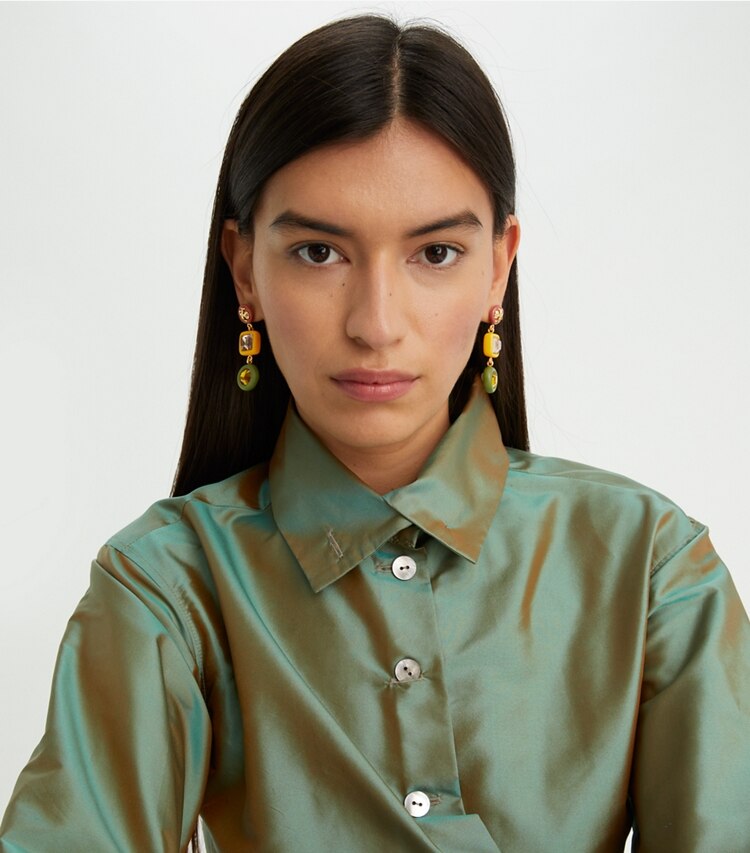 Tory Burch designer earrings Roxanne Crystal Small Double-Drop Earring in Rolled Brass/Matte Black accessory on model