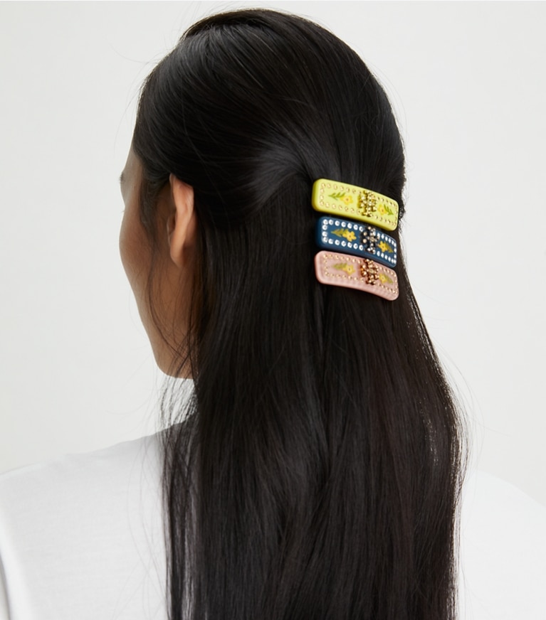 Tory Burch designer hair pins Roxanne Embellished Small Barrette in Rolled Tory Gold / Coral front