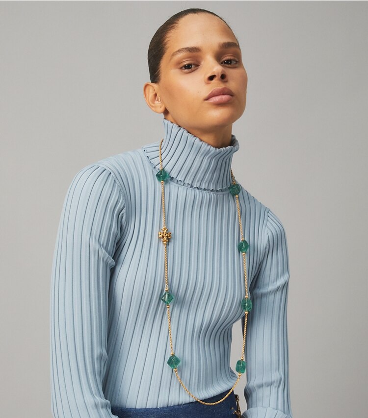 Tory Burch designer necklaces Roxanne Long Necklace in Rolled Brass / Azure Green accessory on model