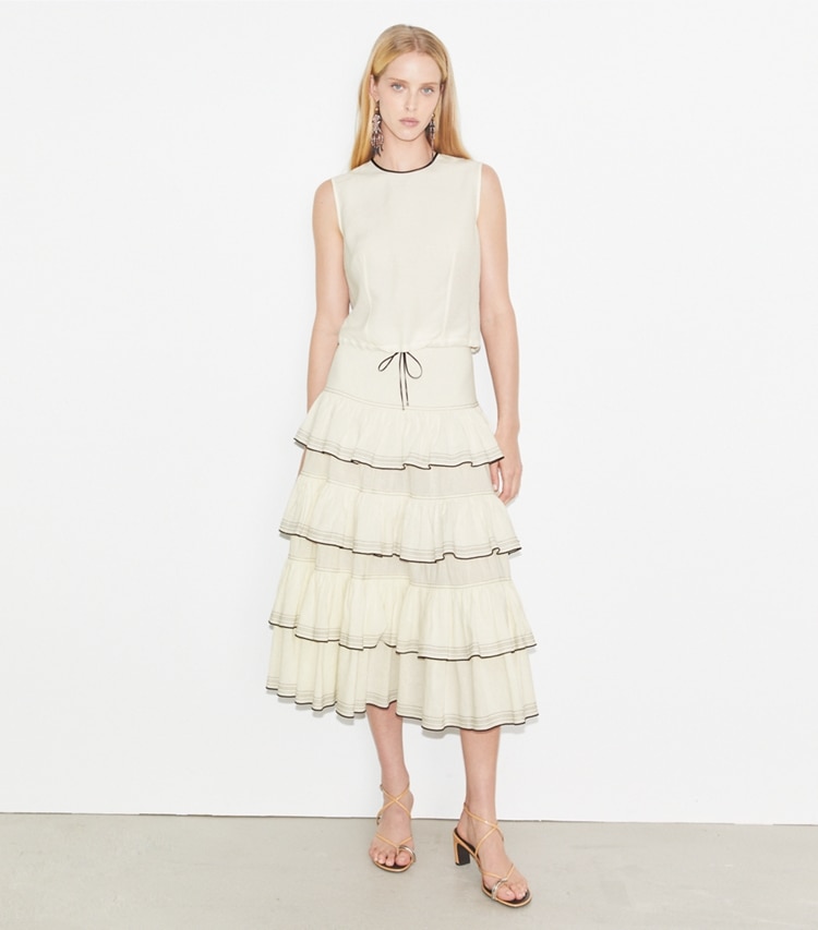 Tory Burch designer bottoms Ruffle Cotton Skirt in Biscuit on model front