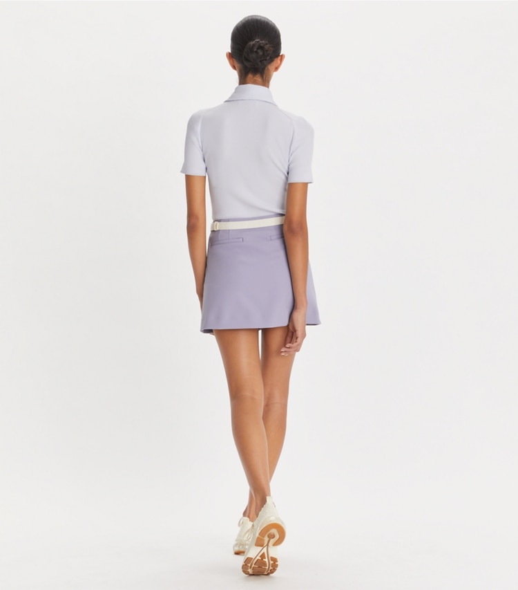 Tory Sport designer bottoms Ruffle Stretch Golf Skirt in Lilac Whisper on model back